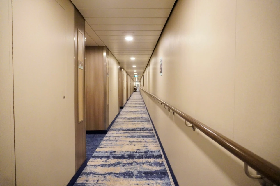 a long hallway with white walls
